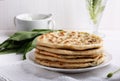 Khychiny Ã¢â¬â traditional caucasian flatbread filled with ÃÂheese and herbs